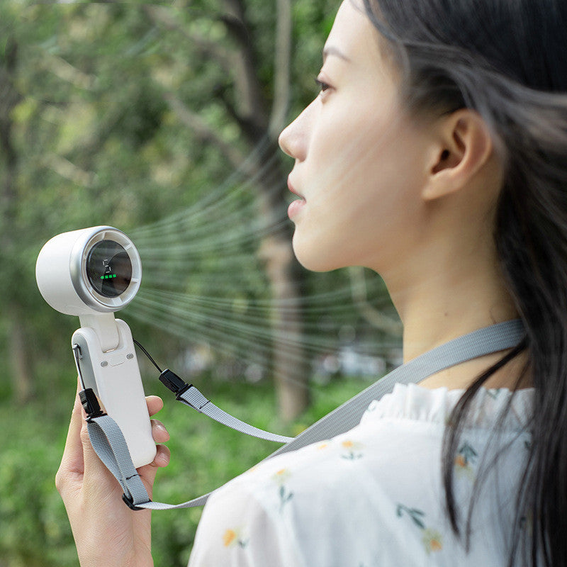 Folding Mini Turbo Fan – Wearable, Handheld & Desktop Use (180° Adjustable)
